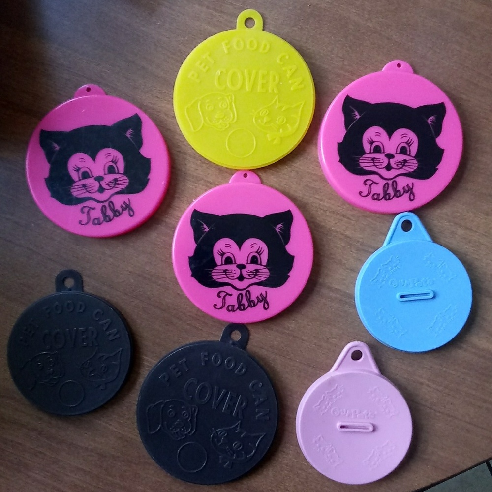 Lot of cat food can covers like new!